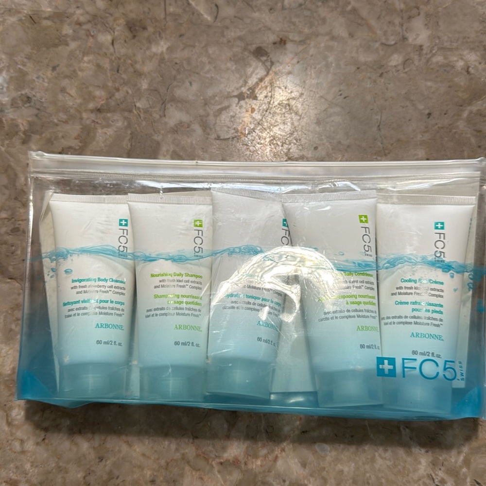 Arbonne FC five travel set includes travel zip bag